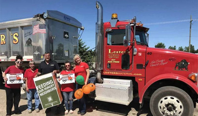 Big trucks attract lots of interest, food donations